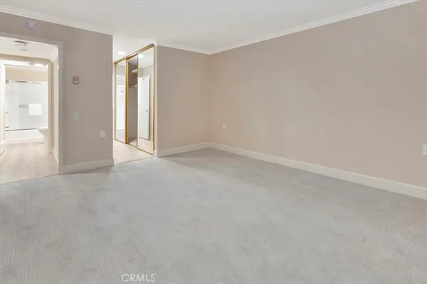a white toilet sitting next to a bath tub shower
