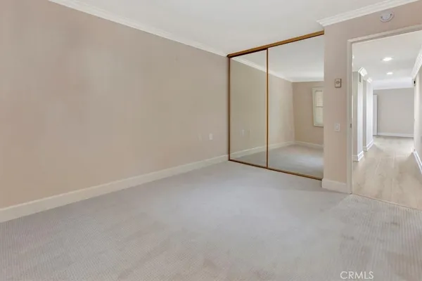 a view of a glass door and deck