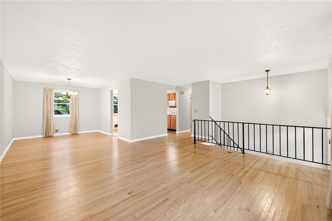60 Barnfield Road Henrietta, NY 14534 - Photo 6 of 38 Main level living/dining room