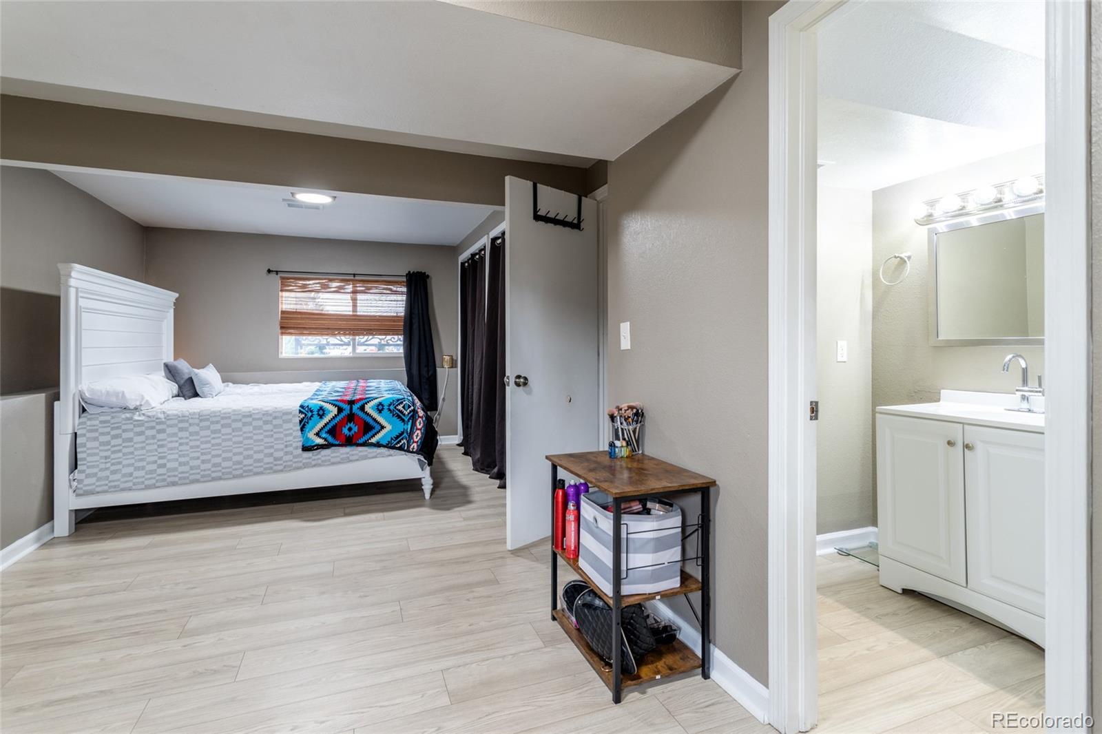 3192 West 3rd Street Road Greeley, CO 80631 - Photo 13 of 31 a living room with furniture and a window