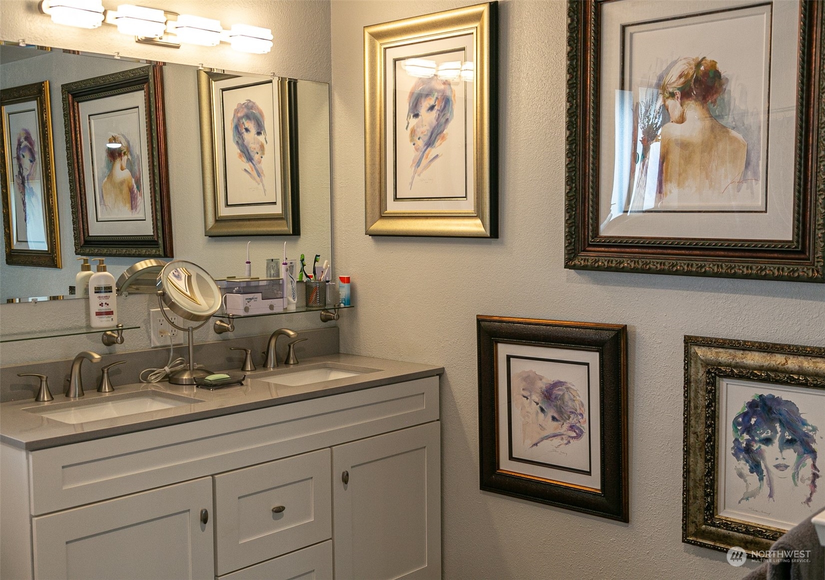 240 Osborn Road Port Angeles, WA 98362 - Photo 12 of 37 a bathroom with mirror and painting on the wall
