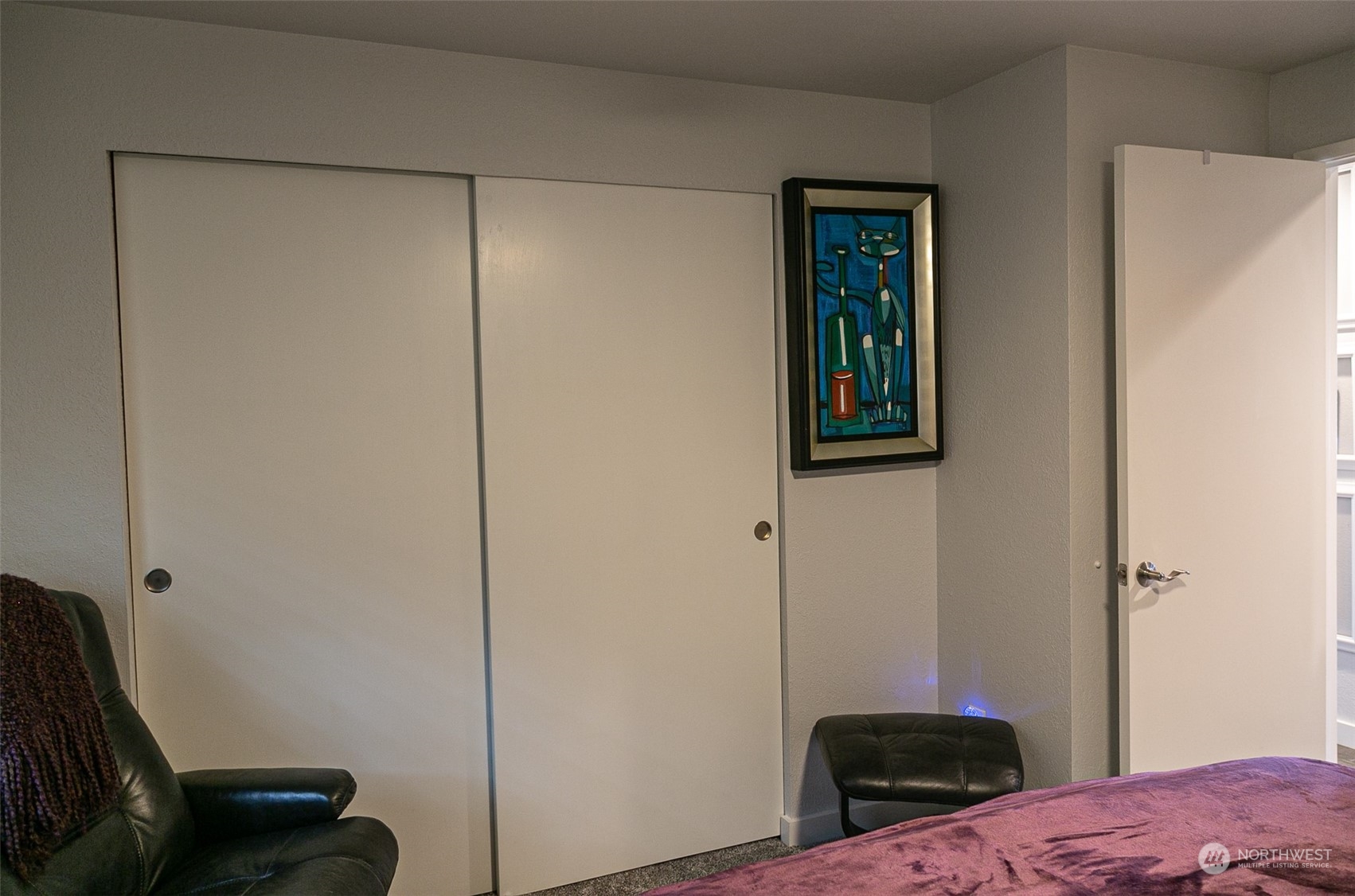 240 Osborn Road Port Angeles, WA 98362 - Photo 19 of 37 a bedroom with a bed and a closet