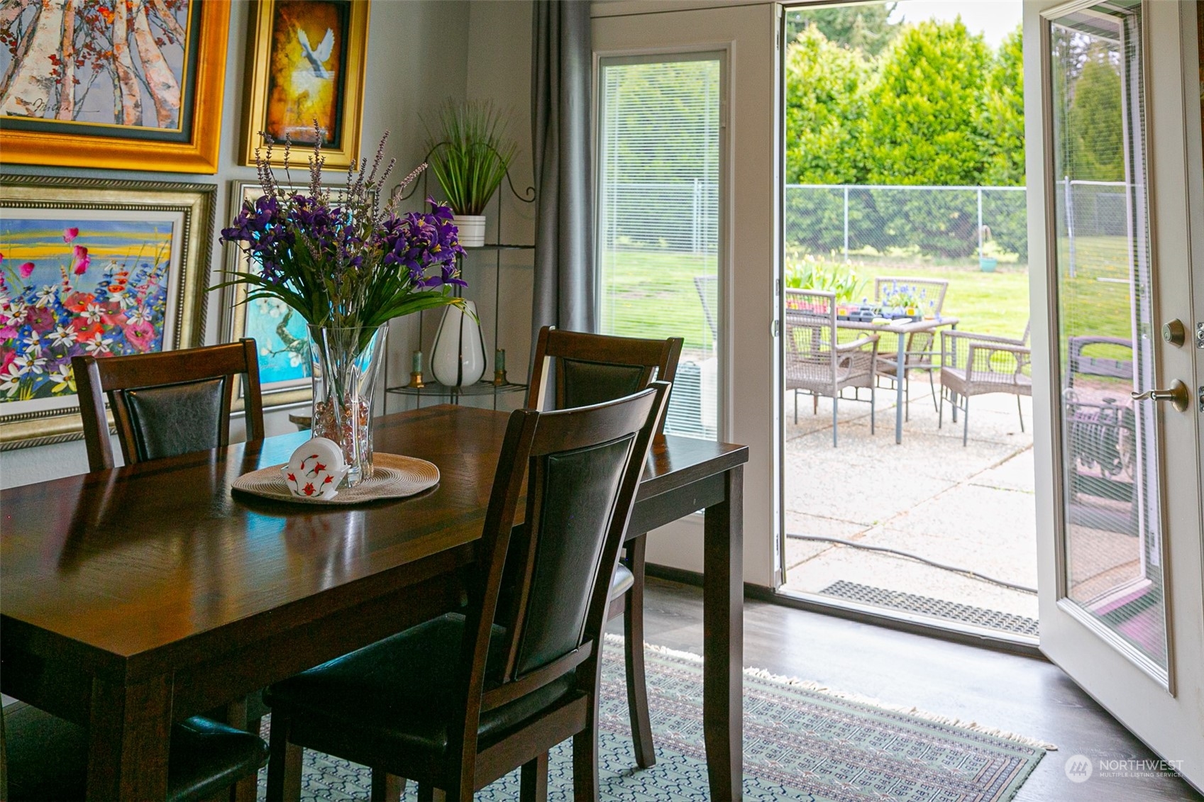 240 Osborn Road Port Angeles, WA 98362 - Photo 23 of 37 a view of a dining room with furniture and a potted plant