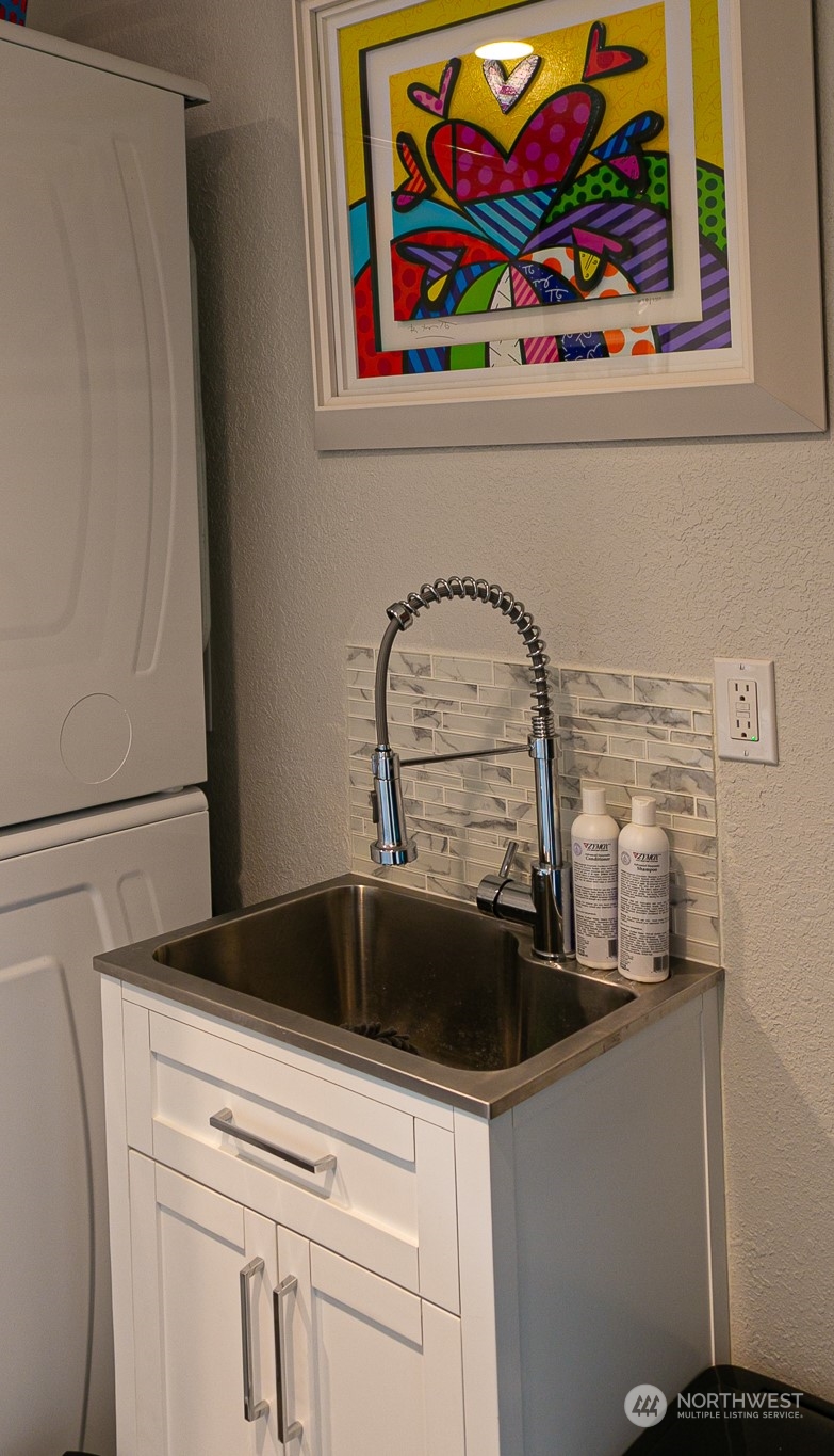 240 Osborn Road Port Angeles, WA 98362 - Photo 26 of 37 a close view of sink and cabinet