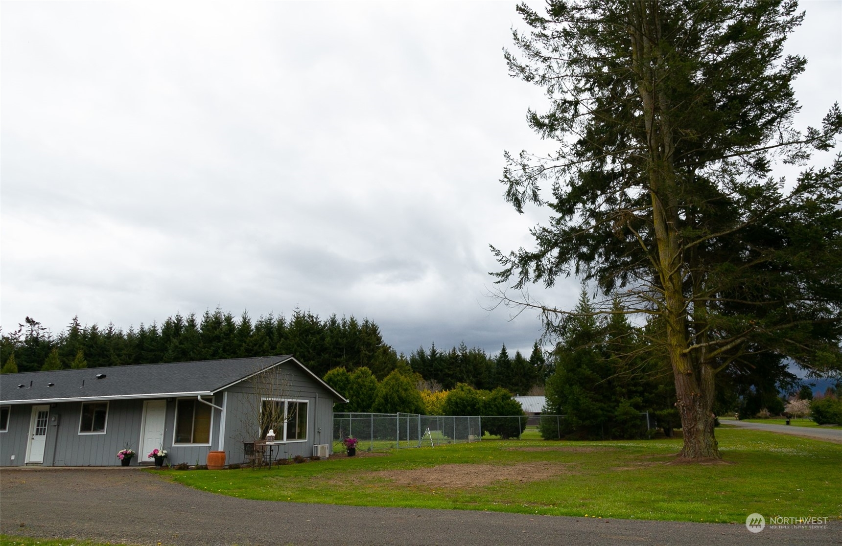 240 Osborn Road Port Angeles, WA 98362 - Photo 29 of 37 a front view of a house with garden