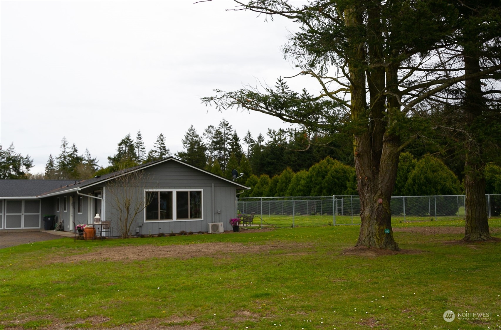 240 Osborn Road Port Angeles, WA 98362 - Photo 30 of 37 a front view of a house with a garden