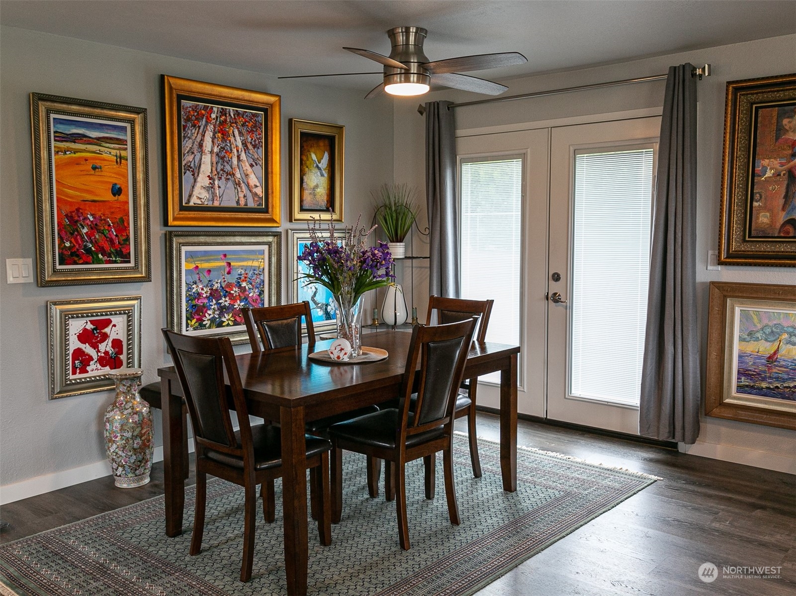 240 Osborn Road Port Angeles, WA 98362 - Photo 3 of 37 a view of a dining room with furniture wooden floor and a chandelier