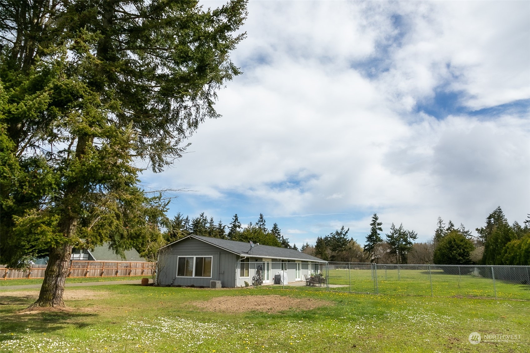 240 Osborn Road Port Angeles, WA 98362 - Photo 31 of 37 a front view of a house with a garden