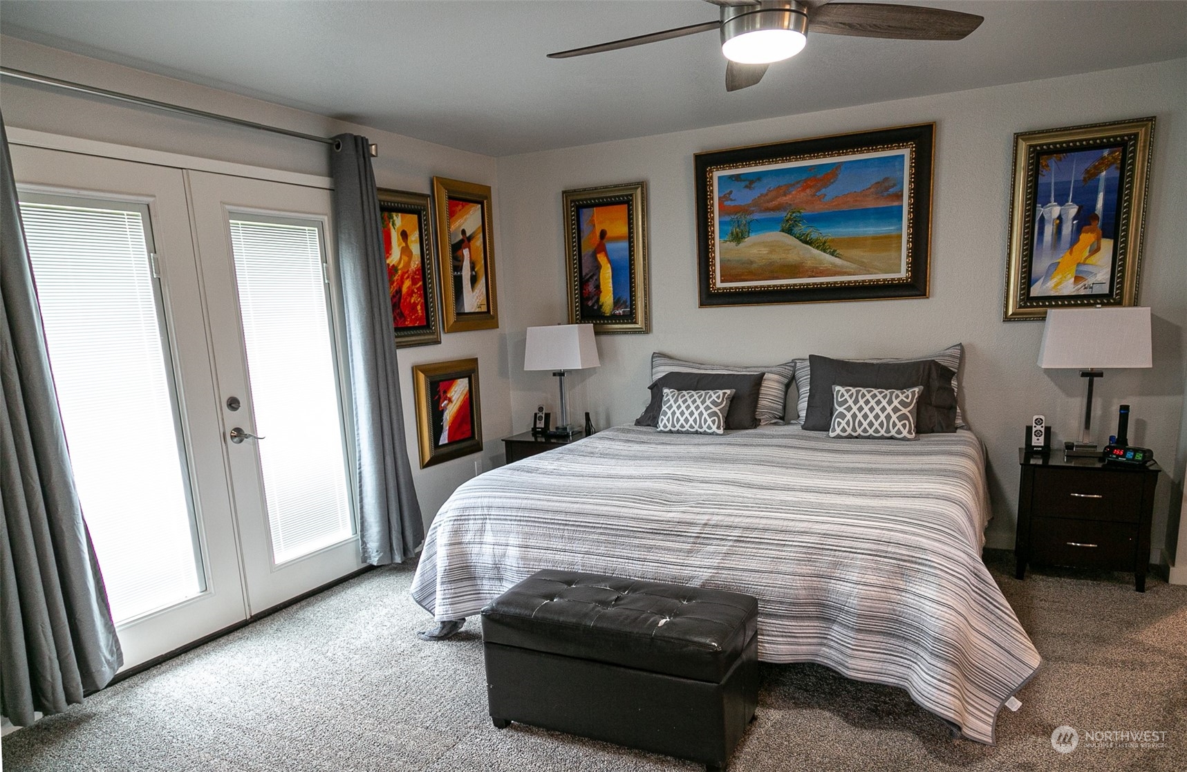 240 Osborn Road Port Angeles, WA 98362 - Photo 10 of 37 a bedroom with a bed and a painting on the wall