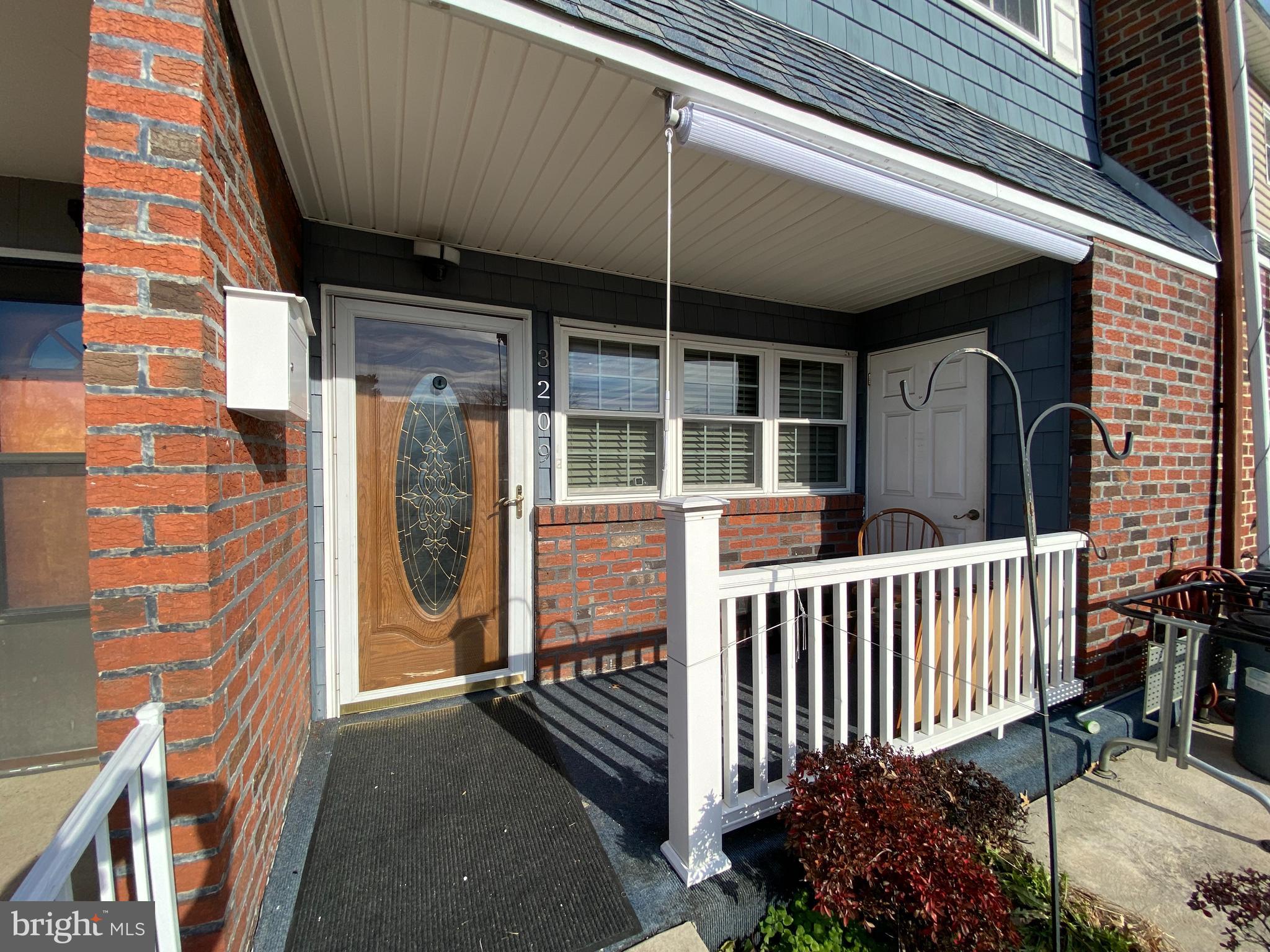3209 Fairdale Road Philadelphia, PA 19154 - Photo 2 of 23 Covered front porch with storage closet