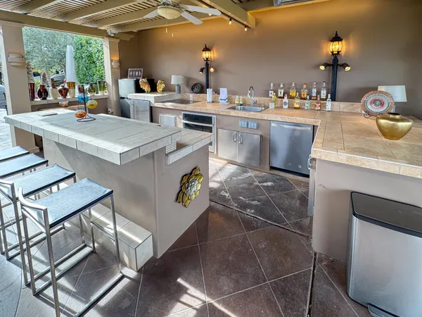 a view of kitchen and sink