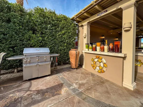 a view of outdoor space and barbecue grill