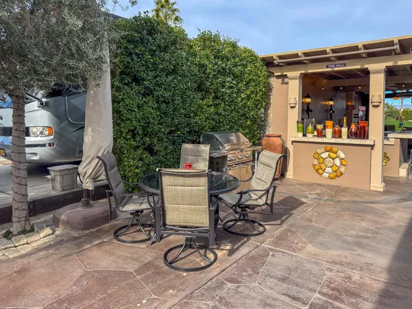 a view of a chairs and tables in patio
