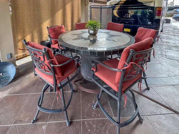 a table and chairs in the terrace
