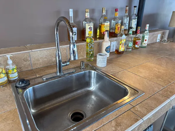 a close view of sink and a faucet