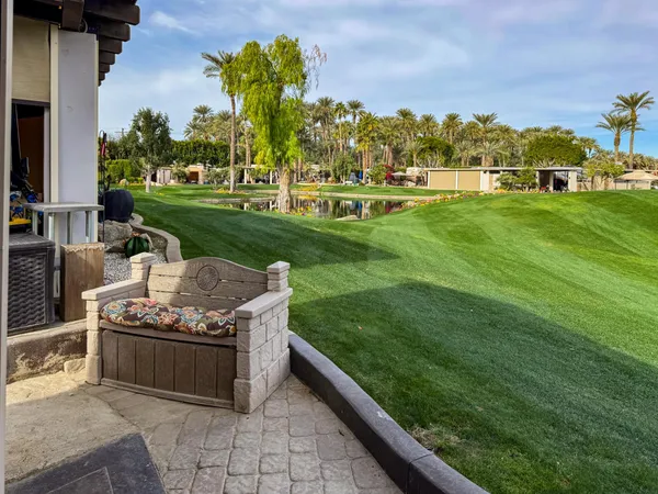 a view of a garden with an outdoor space