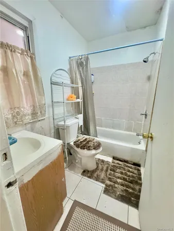 a bathroom with a sink a bathtub and a shower