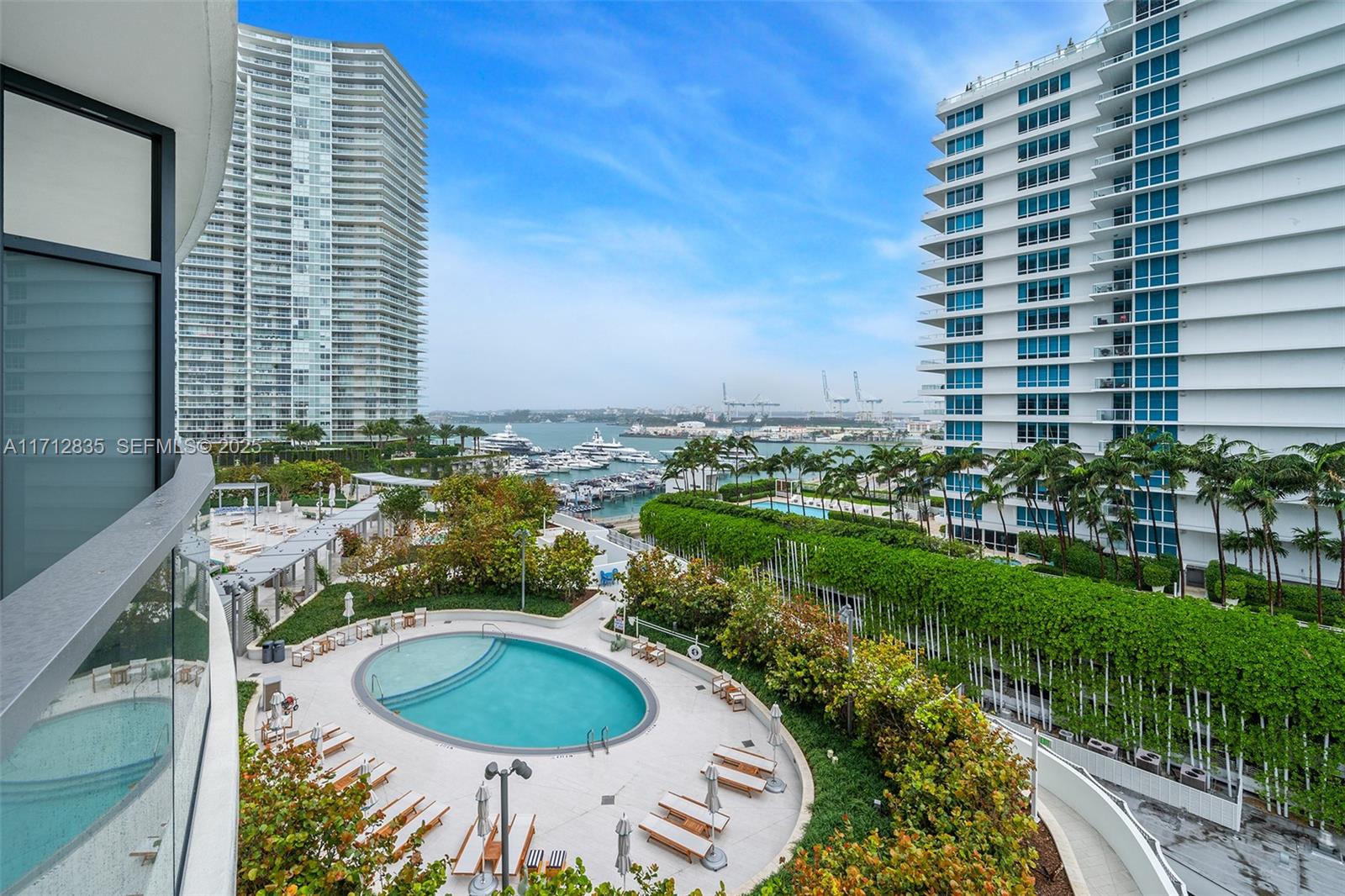 500 Alton Road, Unit 1005 Miami Beach, FL 33139 - Photo 37 of 49 a view of a swimming pool and outdoor space