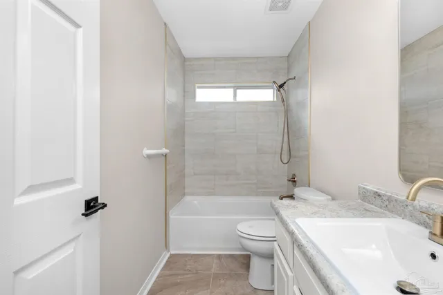 a view of workspace with window and ceiling fan