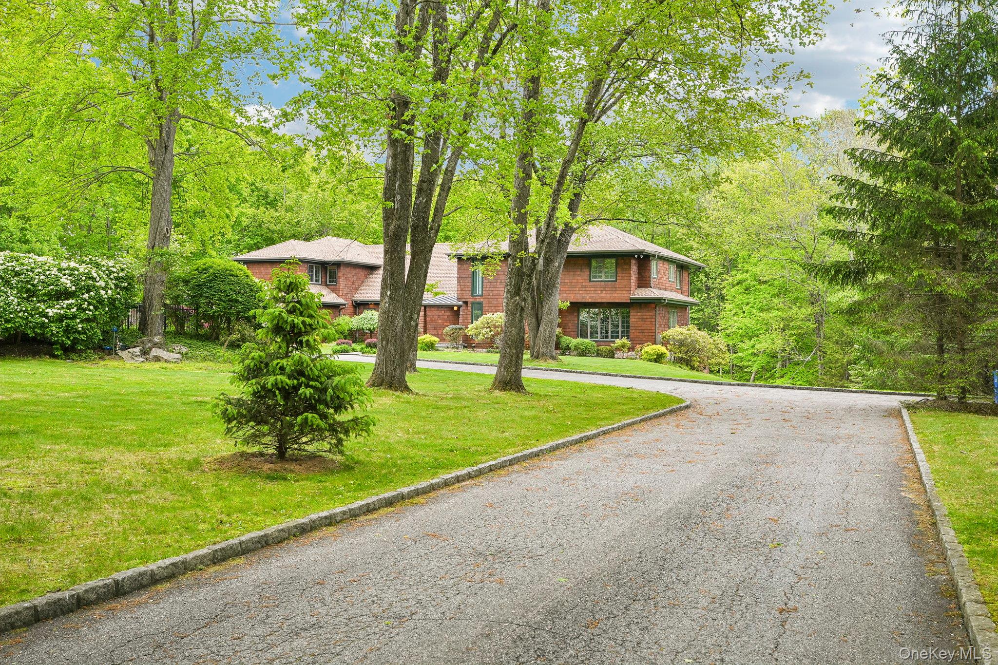 27 Cat Ridge Road North Salem, NY 10560 - Photo 4 of 49 a view of a house with a yard and large trees