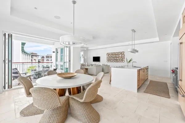 a view of a dining room with furniture window and outside view