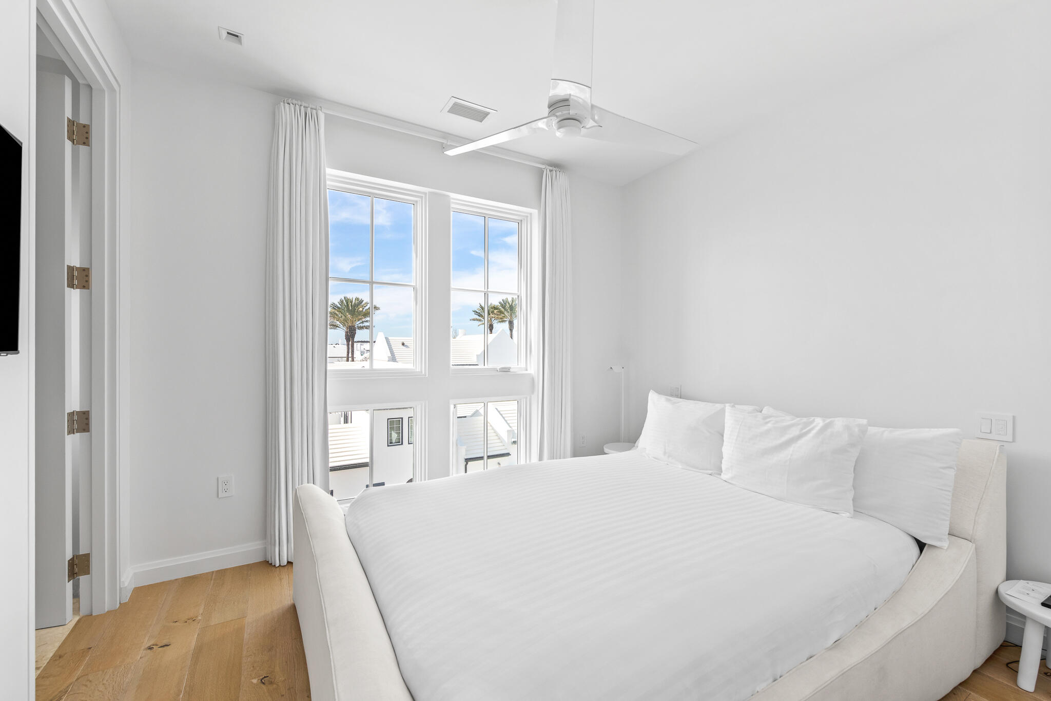 74 Governors Ct Inlet Beach, Unit 304 Inlet Beach, FL 32461 - Photo 12 of 39 a bedroom with a bed and a window