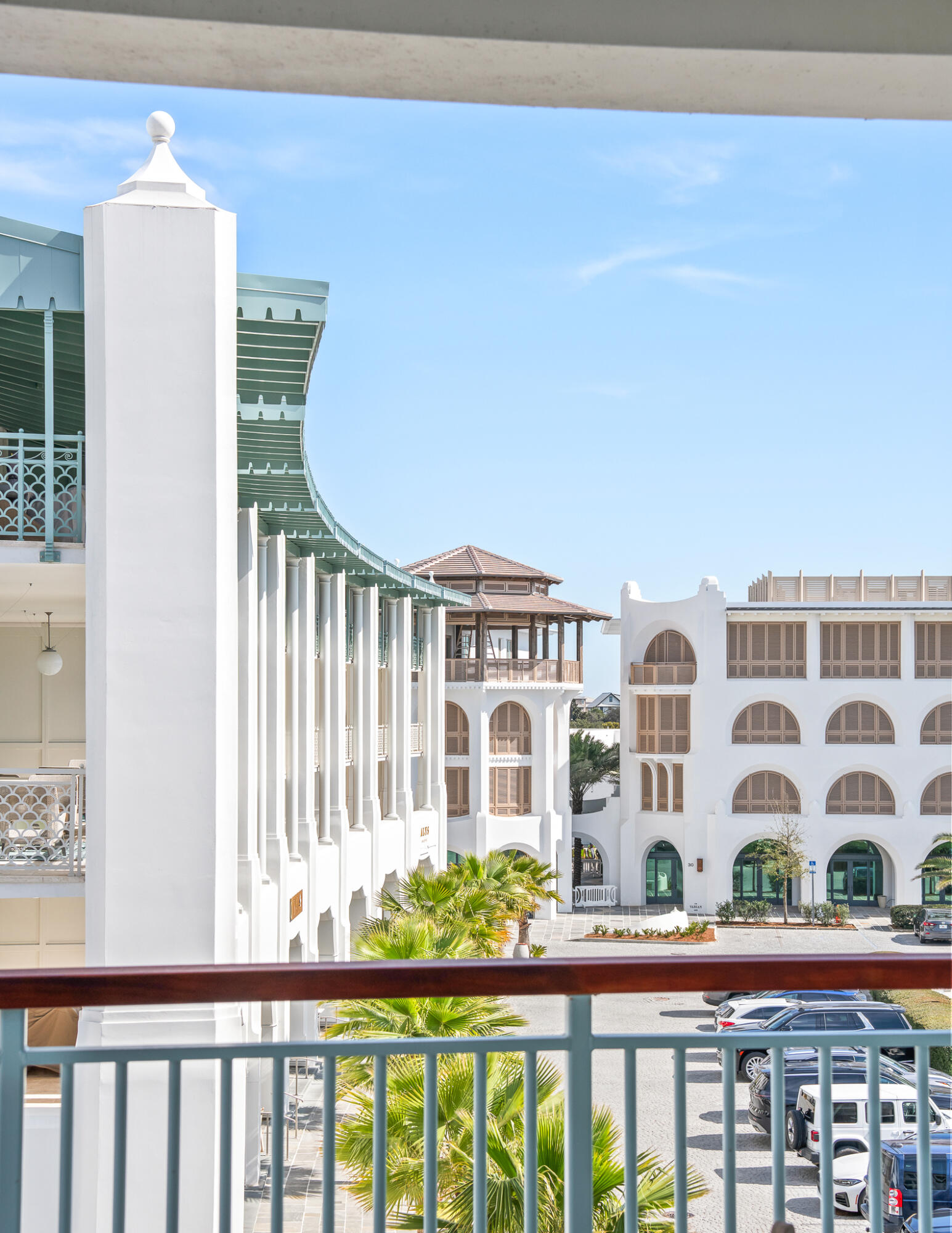 74 Governors Ct Inlet Beach, Unit 304 Inlet Beach, FL 32461 - Photo 23 of 39 a front view of a building with glass door