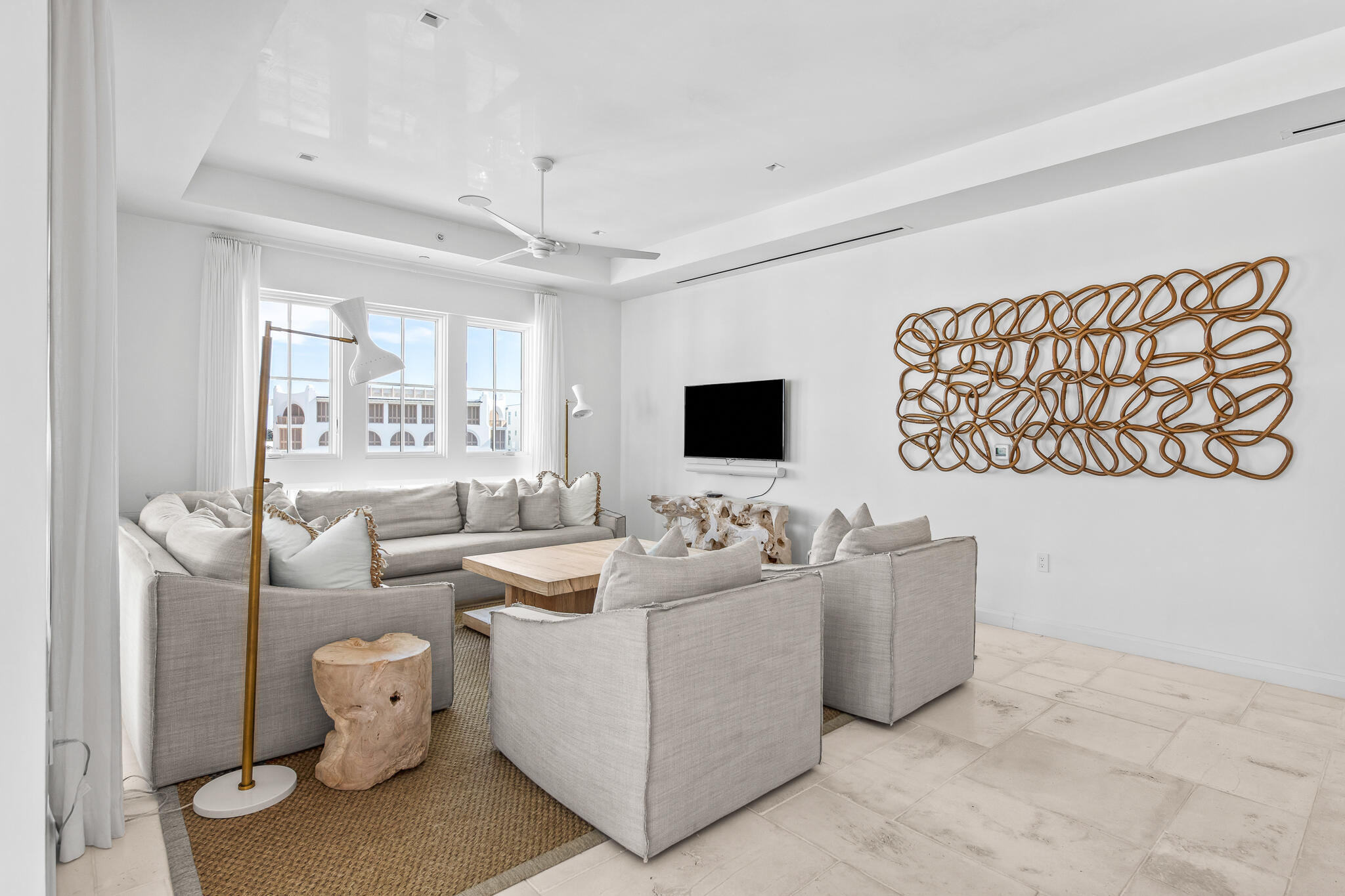 74 Governors Ct Inlet Beach, Unit 304 Inlet Beach, FL 32461 - Photo 7 of 39 a living room with furniture and a flat screen tv