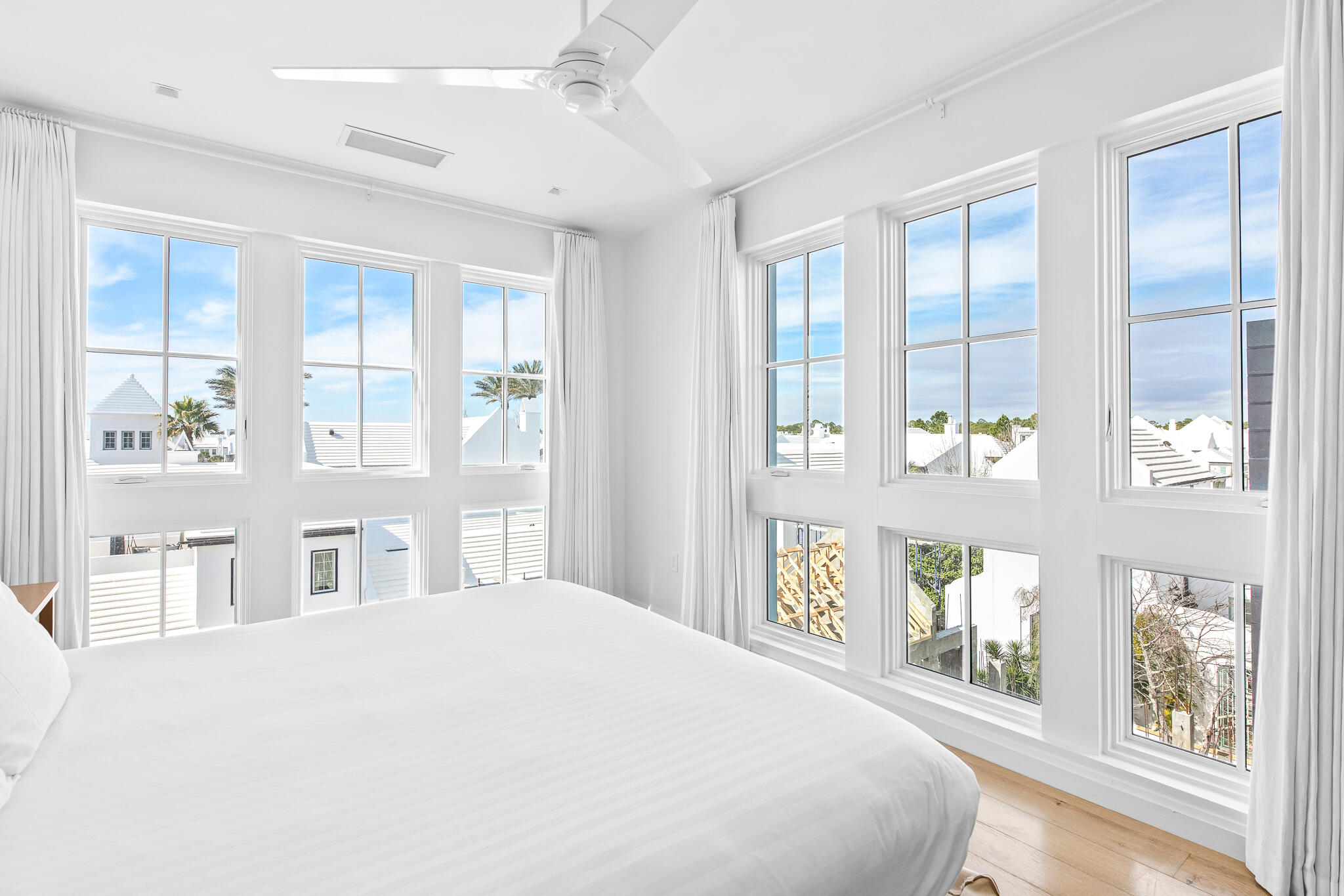 74 Governors Ct Inlet Beach, Unit 304 Inlet Beach, FL 32461 - Photo 10 of 39 a bedroom with large window and walk in closet