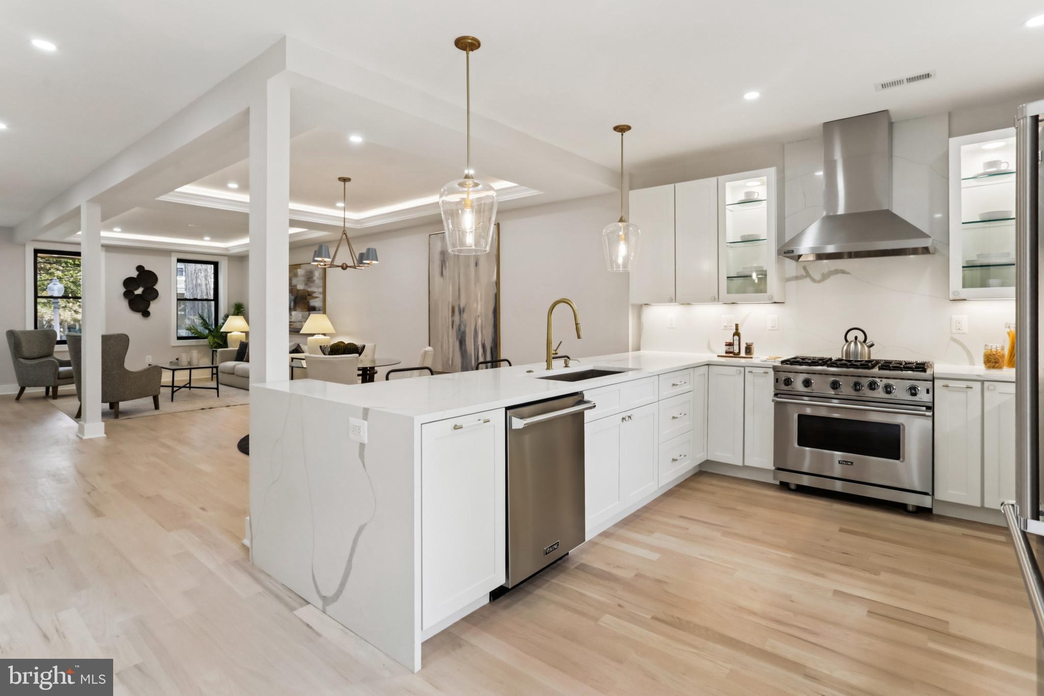 208 Webster Street Northwest Washington, DC 20011 - Photo 12 of 46 a kitchen with stove a sink and a refrigerator