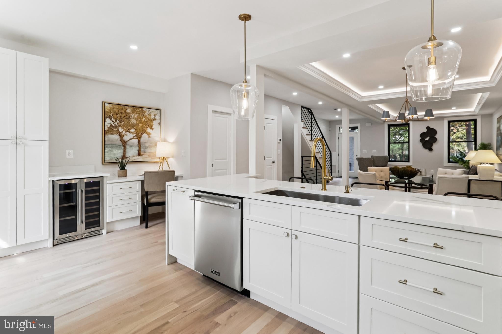 208 Webster Street Northwest Washington, DC 20011 - Photo 13 of 46 a kitchen with stainless steel appliances granite countertop a sink a stove and a wooden floors