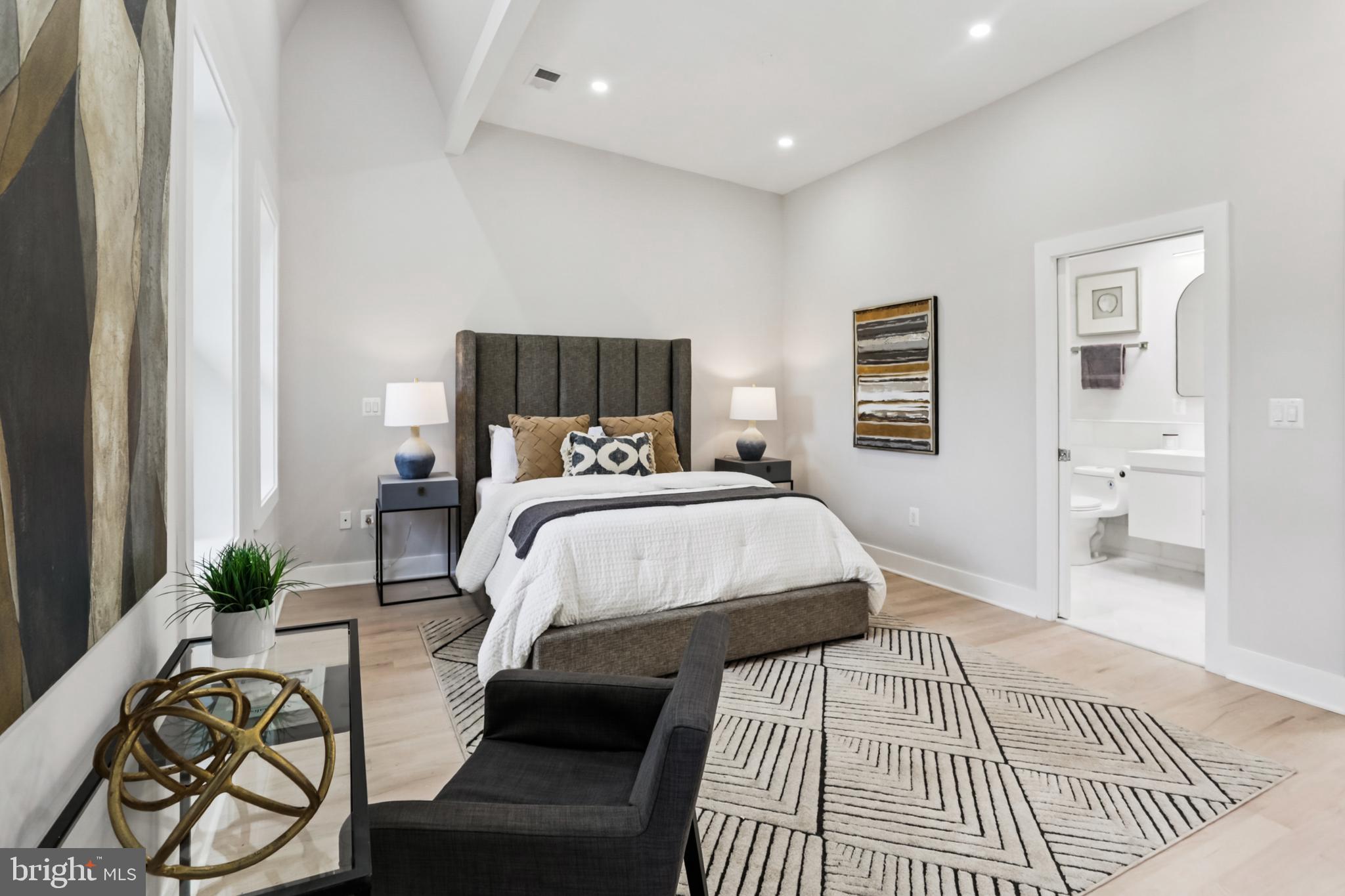 208 Webster Street Northwest Washington, DC 20011 - Photo 17 of 46 a bedroom with a bed a mirror and furniture