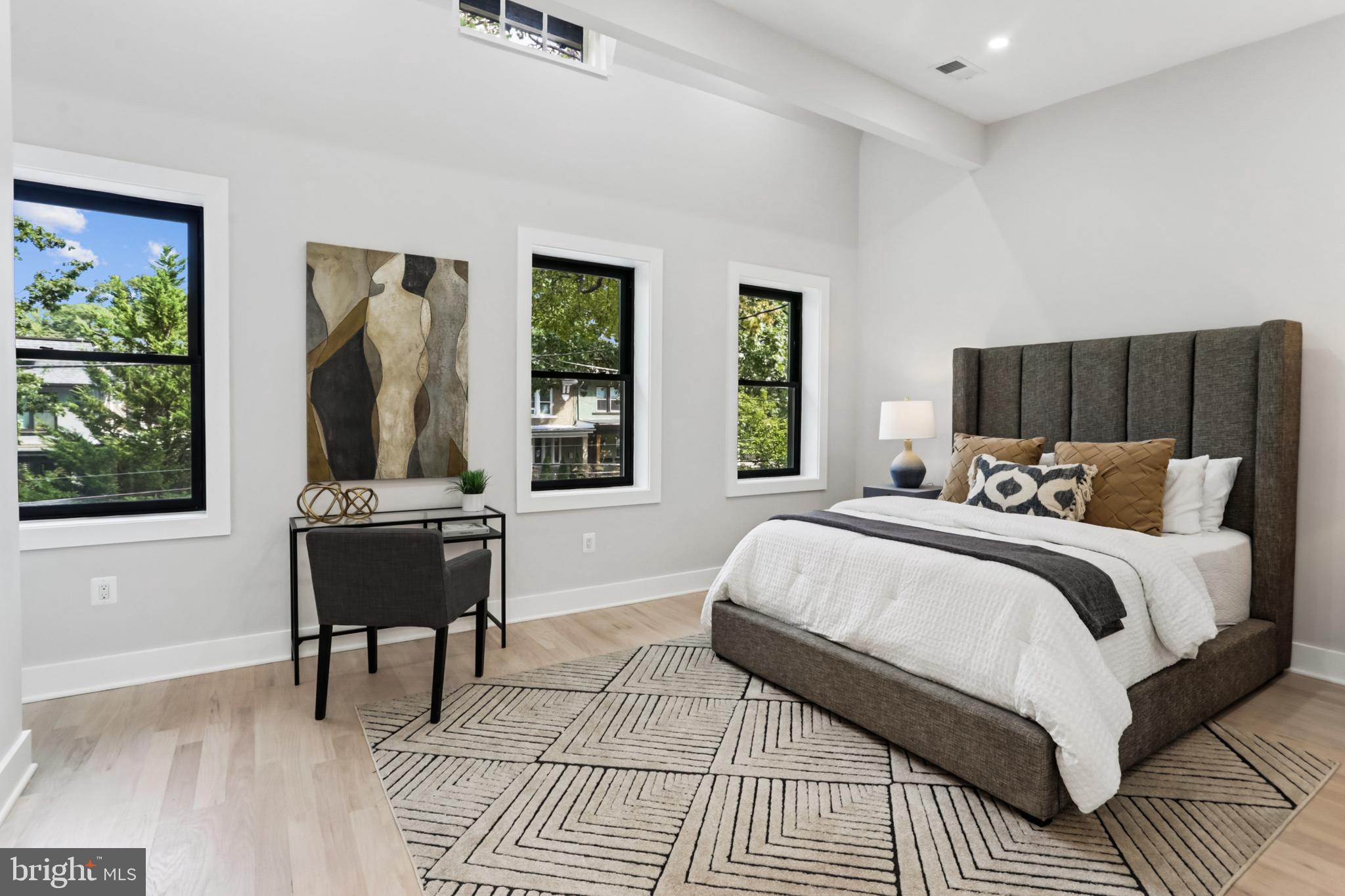 208 Webster Street Northwest Washington, DC 20011 - Photo 18 of 46 a bedroom with a bed and a window