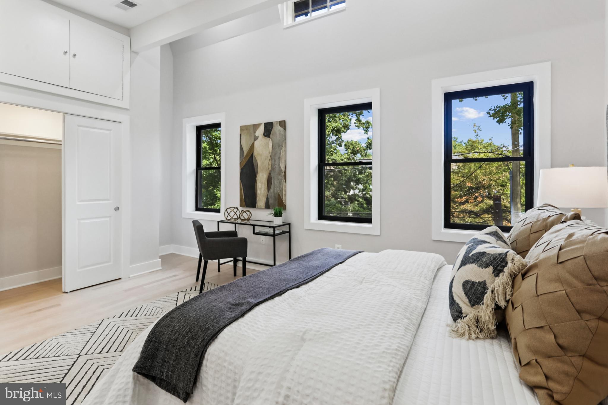 208 Webster Street Northwest Washington, DC 20011 - Photo 20 of 46 a bedroom with a bed and a large window