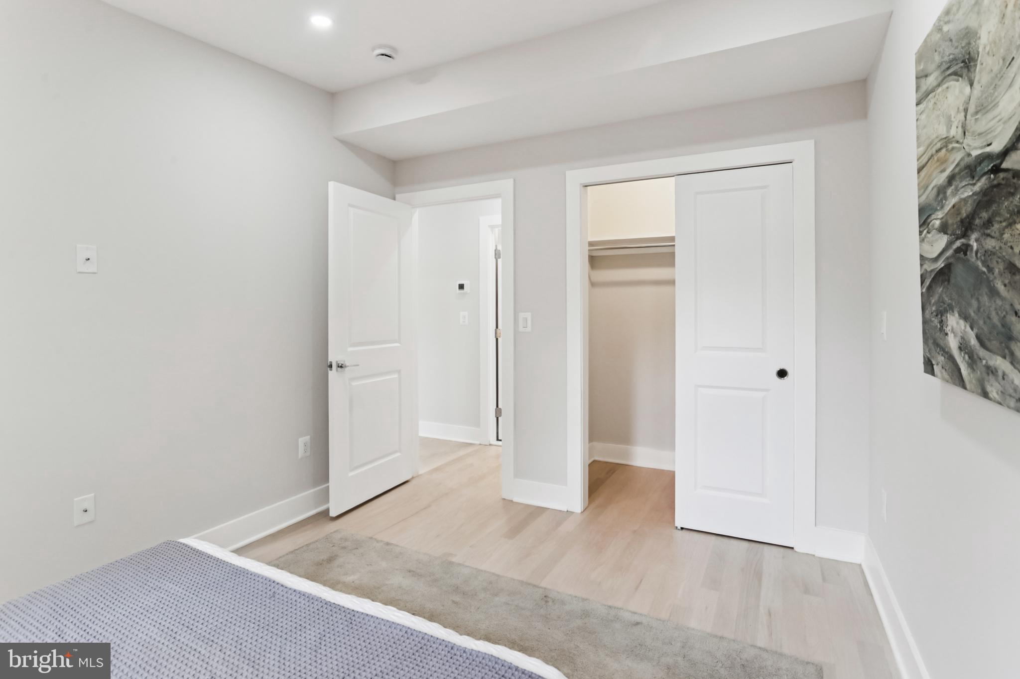 208 Webster Street Northwest Washington, DC 20011 - Photo 25 of 46 wooden floor in an empty room