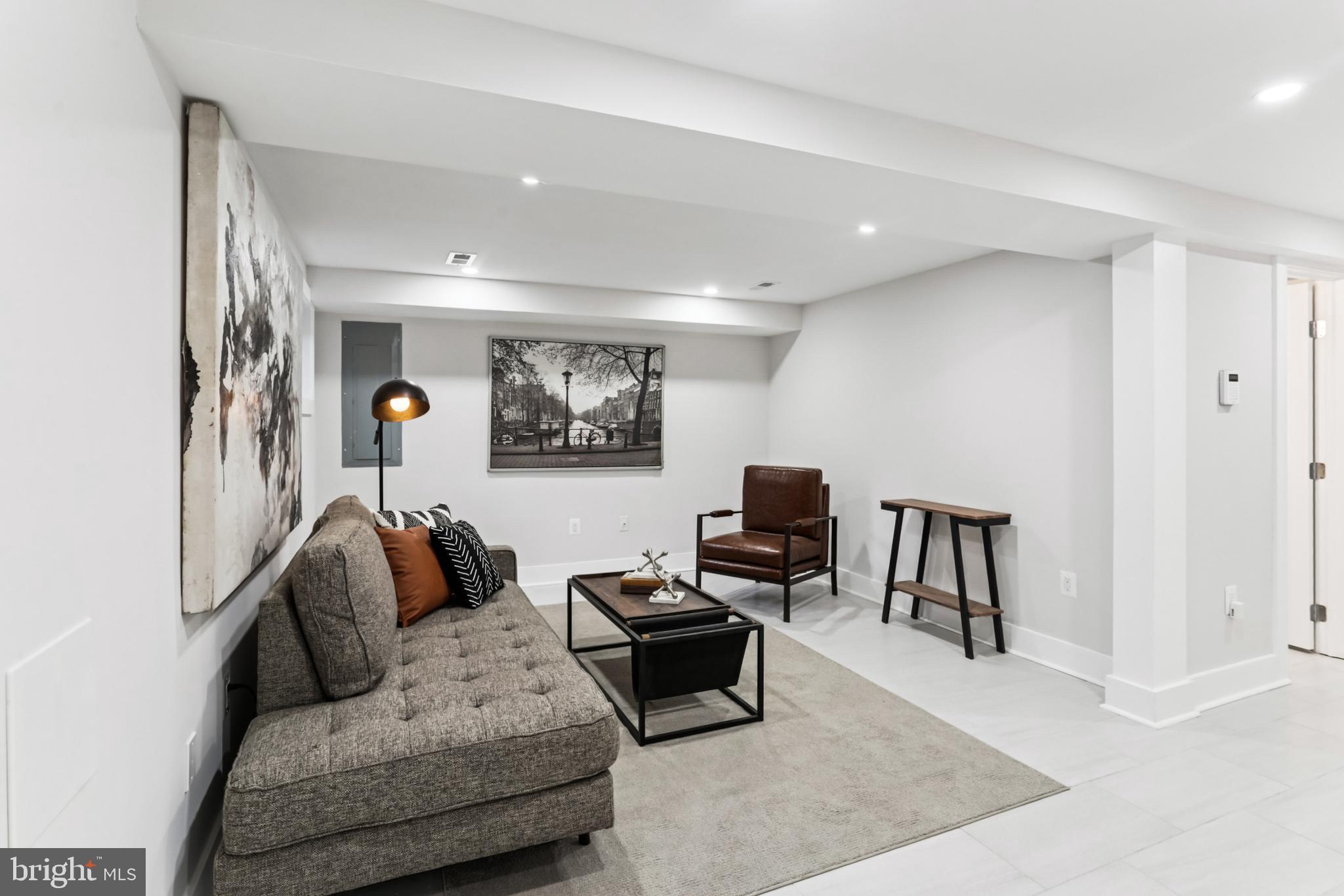 208 Webster Street Northwest Washington, DC 20011 - Photo 32 of 46 a living room with furniture and a piano