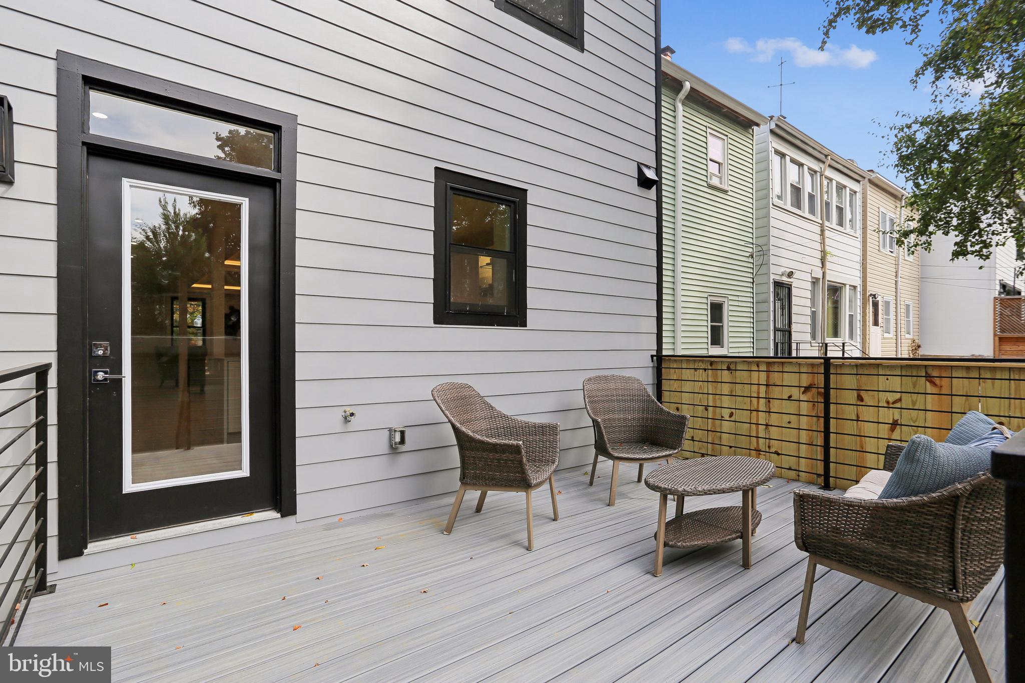 208 Webster Street Northwest Washington, DC 20011 - Photo 43 of 46 a view of a patio with couple of chairs and a couch