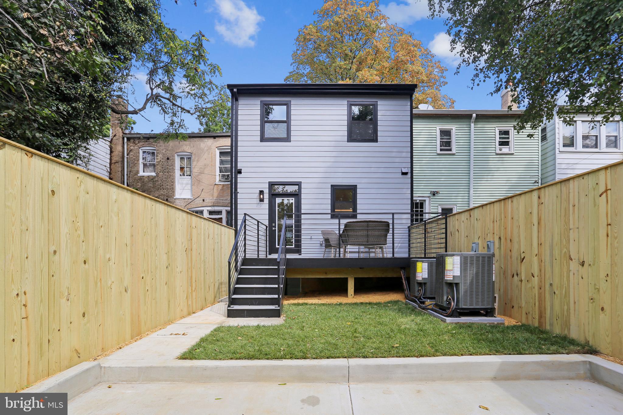 208 Webster Street Northwest Washington, DC 20011 - Photo 45 of 46 a view of a house with a yard