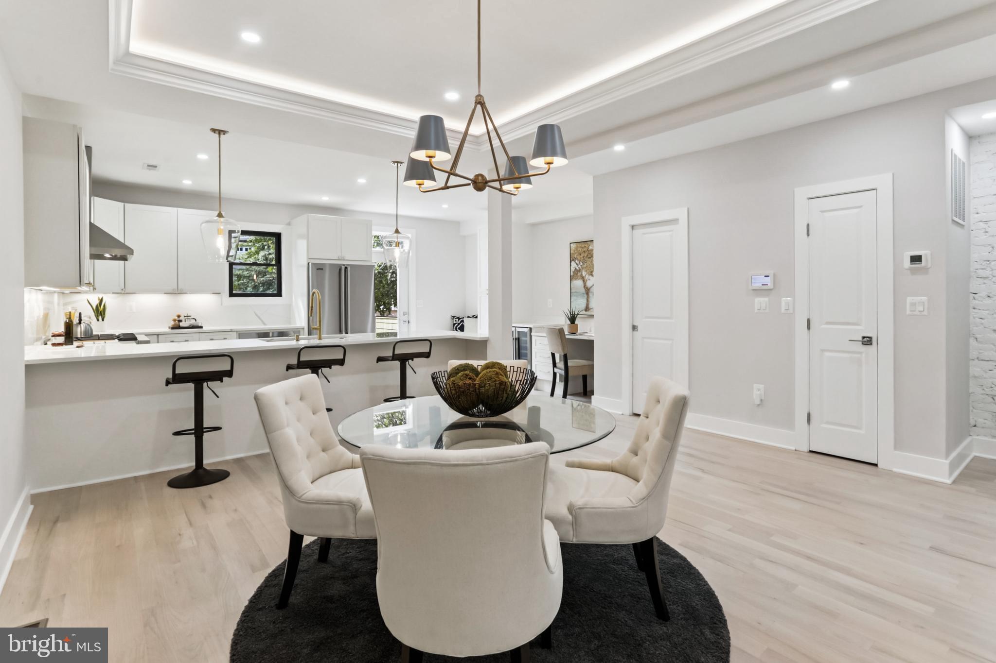 208 Webster Street Northwest Washington, DC 20011 - Photo 6 of 46 a living room with furniture a chandelier and a chandelier