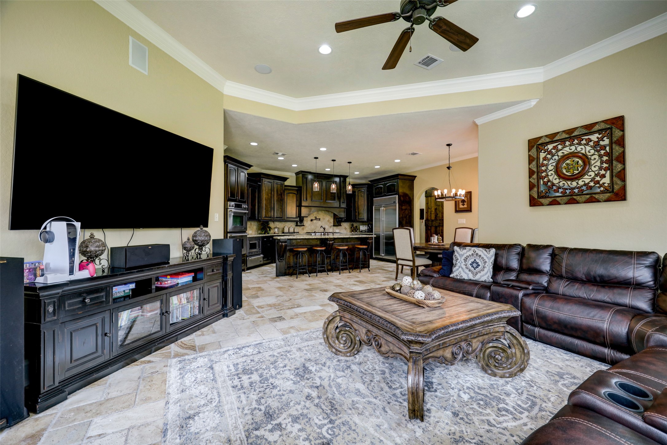 4434 Chateau Creek Way Spring, TX 77386 - Photo 19 of 34 The open concept living room is directly open to the updated kitchen with all new appliances.