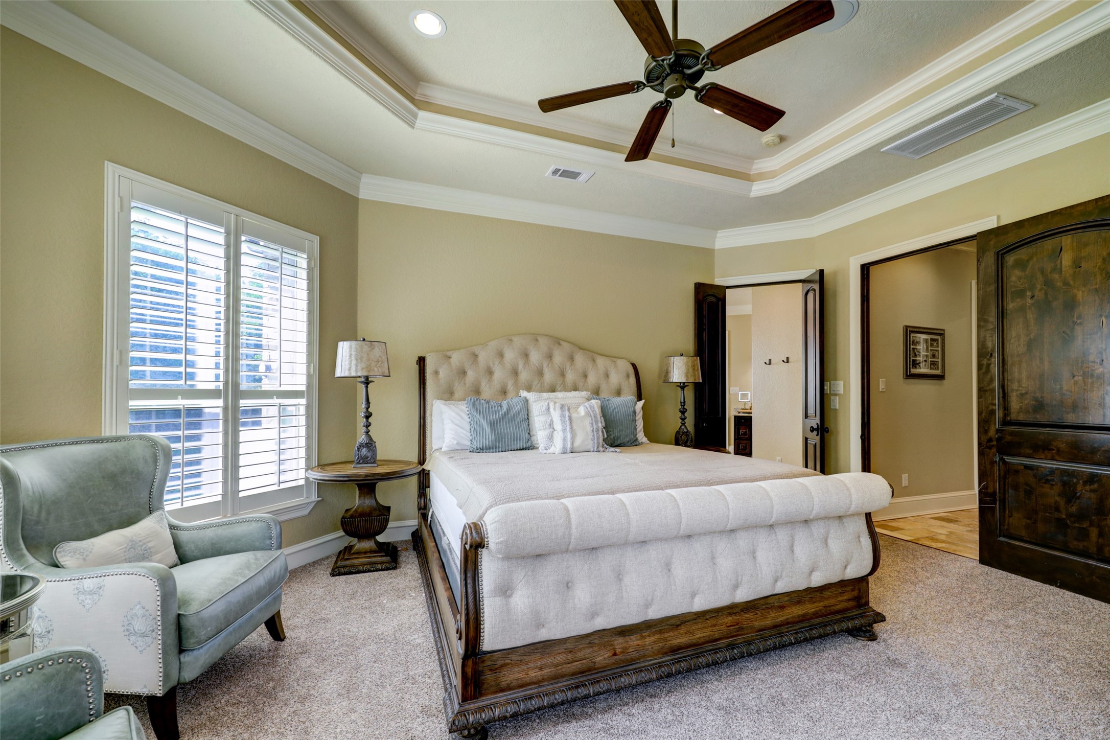 4434 Chateau Creek Way Spring, TX 77386 - Photo 23 of 34 The downstairs primary bedroom with ensuite bathroom and double walk-in closets.
