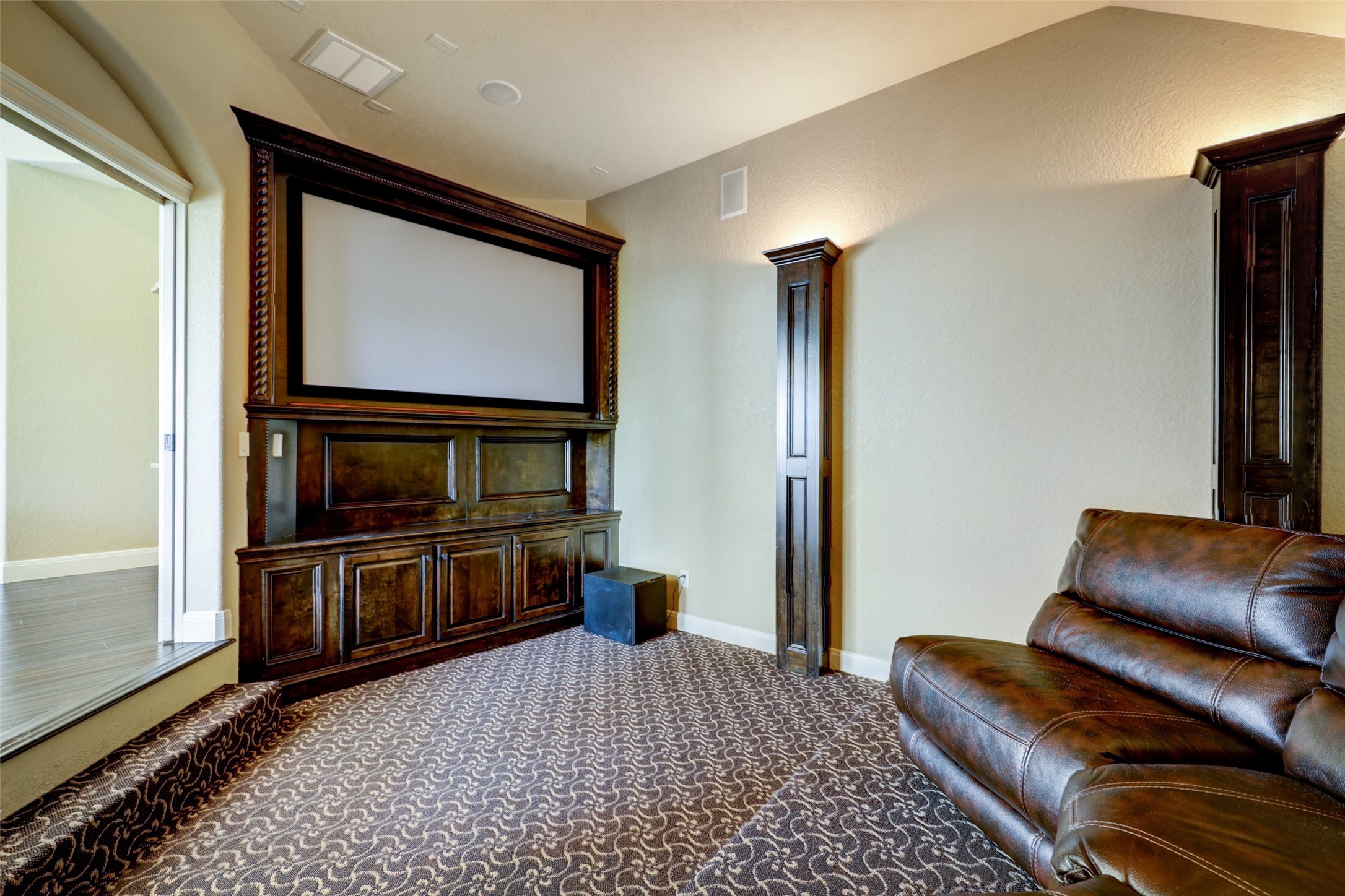 4434 Chateau Creek Way Spring, TX 77386 - Photo 28 of 34 The home has a media room with theater lighting to make the ultimate movie experience.