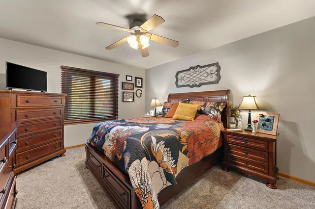 a bedroom with a bed and furniture