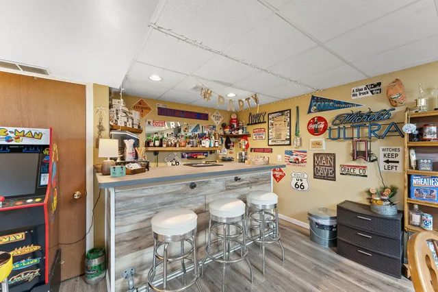 a kitchen with stainless steel appliances granite countertop a sink and cabinets