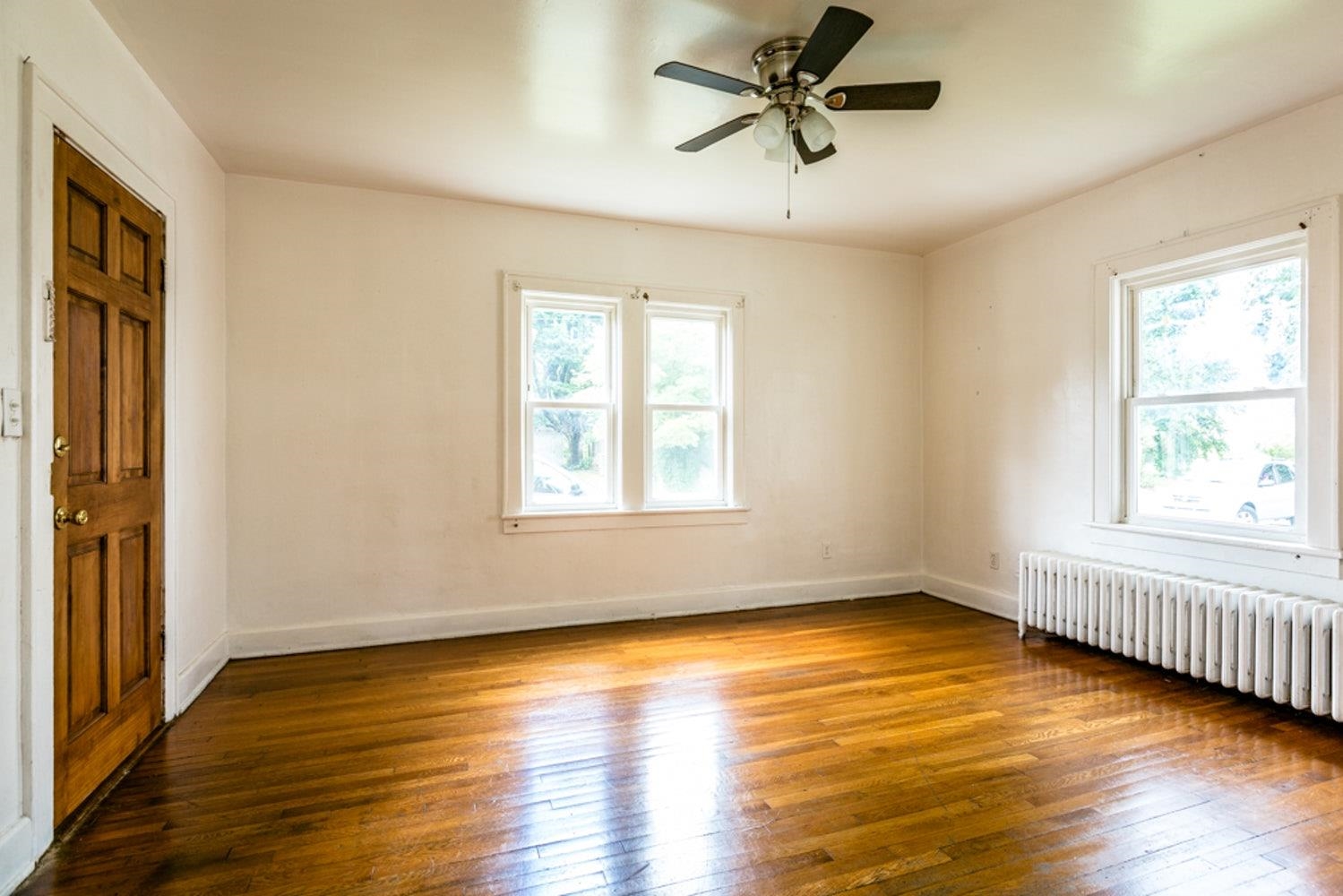 613 Alpha Street Waynesboro, VA 22980 - Photo 5 of 16 a view of an empty room with wooden floor and a window