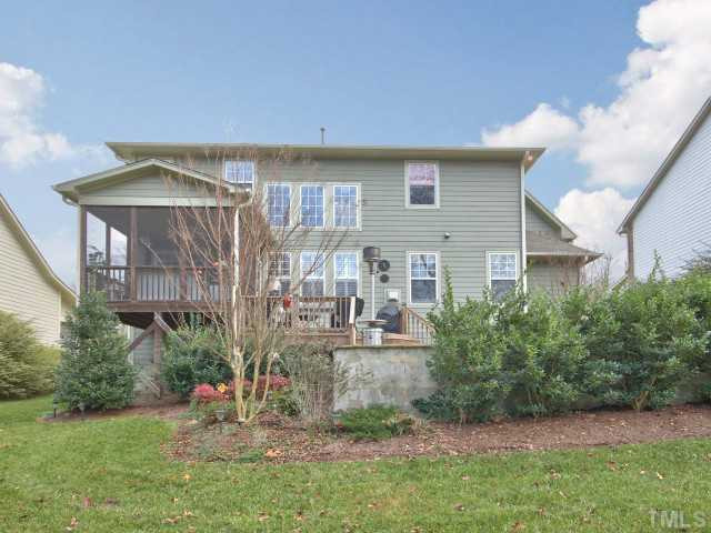 10149 Darling Street Raleigh, NC 27613 - Photo 25 of 25 Your backyard has plenty of room and is beautifully landscaped. Exterior Back
