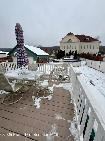 a view of a workspace with furniture