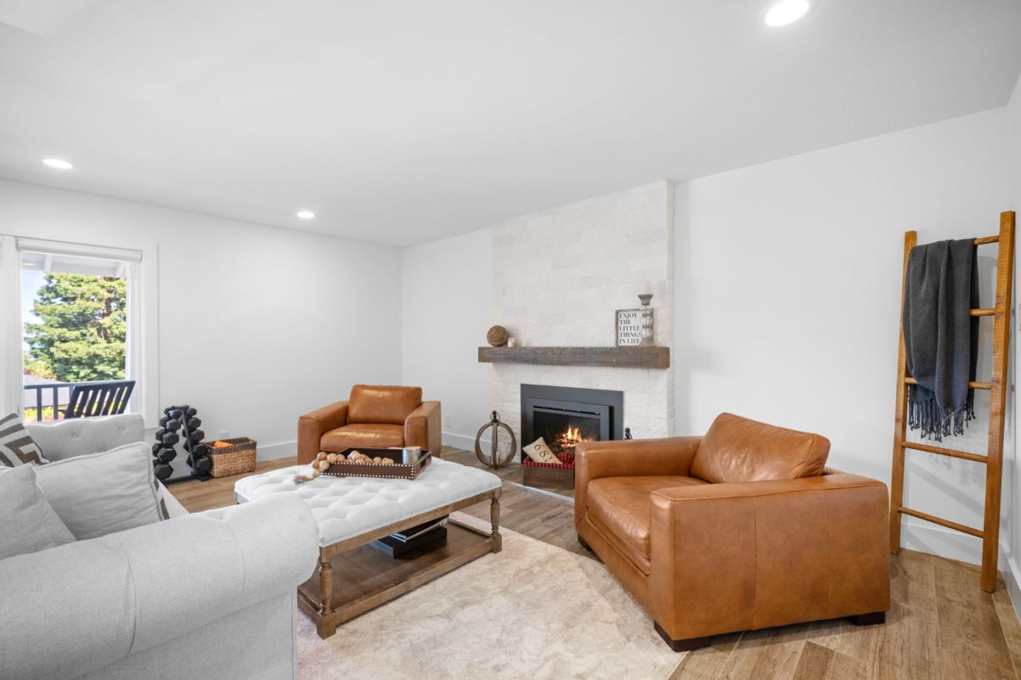 575 Darrell Road Hillsborough, CA 94010 - Photo 13 of 75 a living room with furniture fireplace and a window