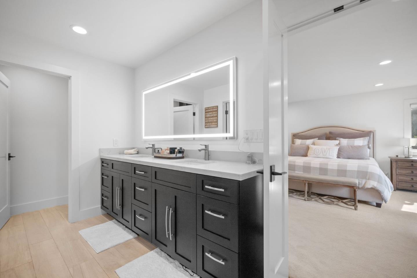 575 Darrell Road Hillsborough, CA 94010 - Photo 34 of 75 a spacious bathroom with a double vanity sink and a mirror
