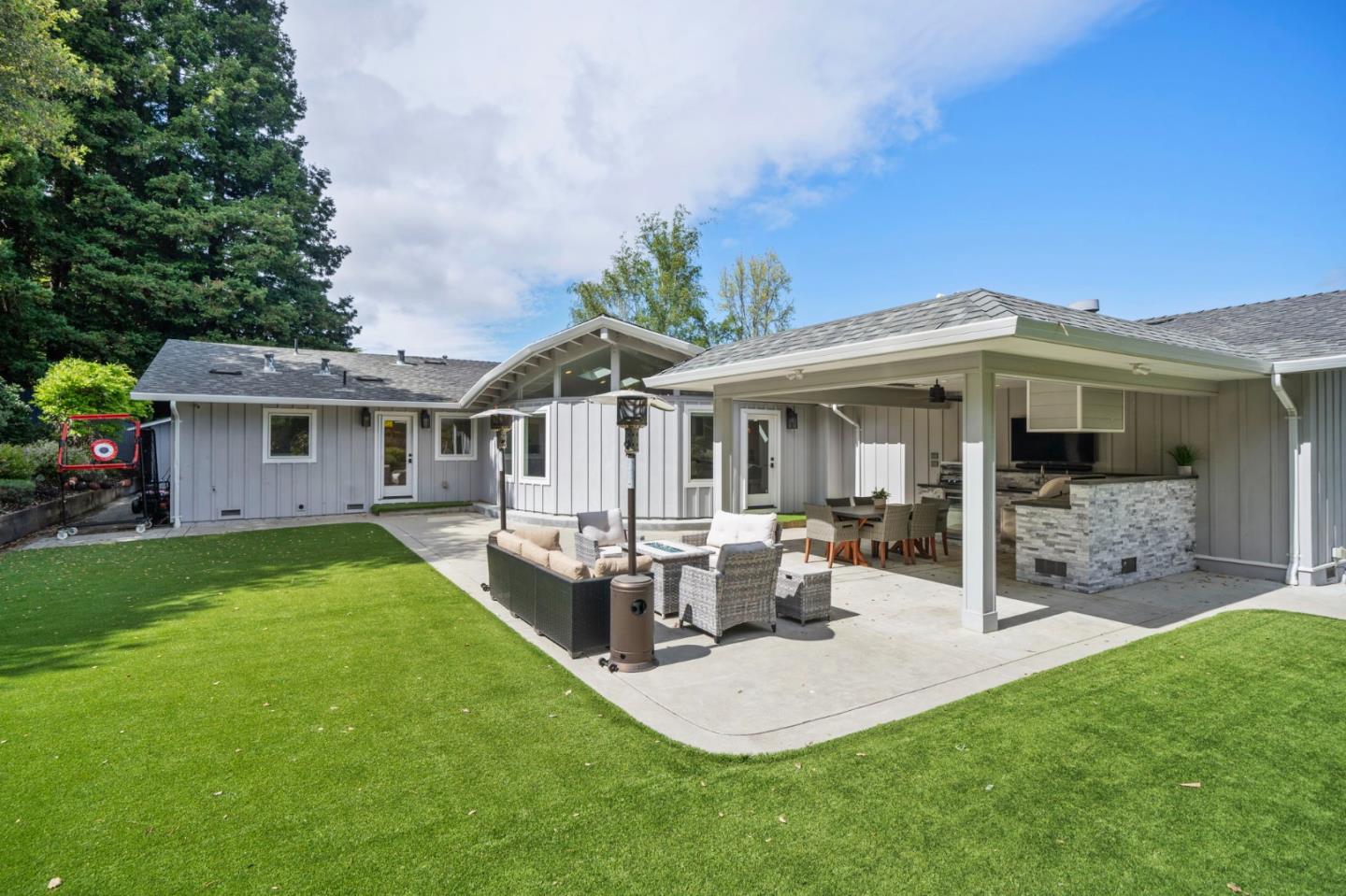 575 Darrell Road Hillsborough, CA 94010 - Photo 55 of 75 a view of a house with a yard patio and swimming pool